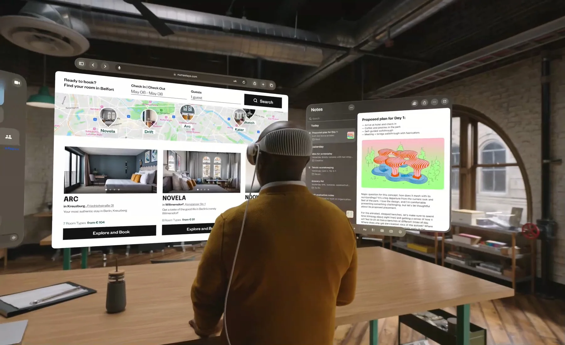 a person wearing an apple vision pro vr headset, looking at the hooked screens in virtual world